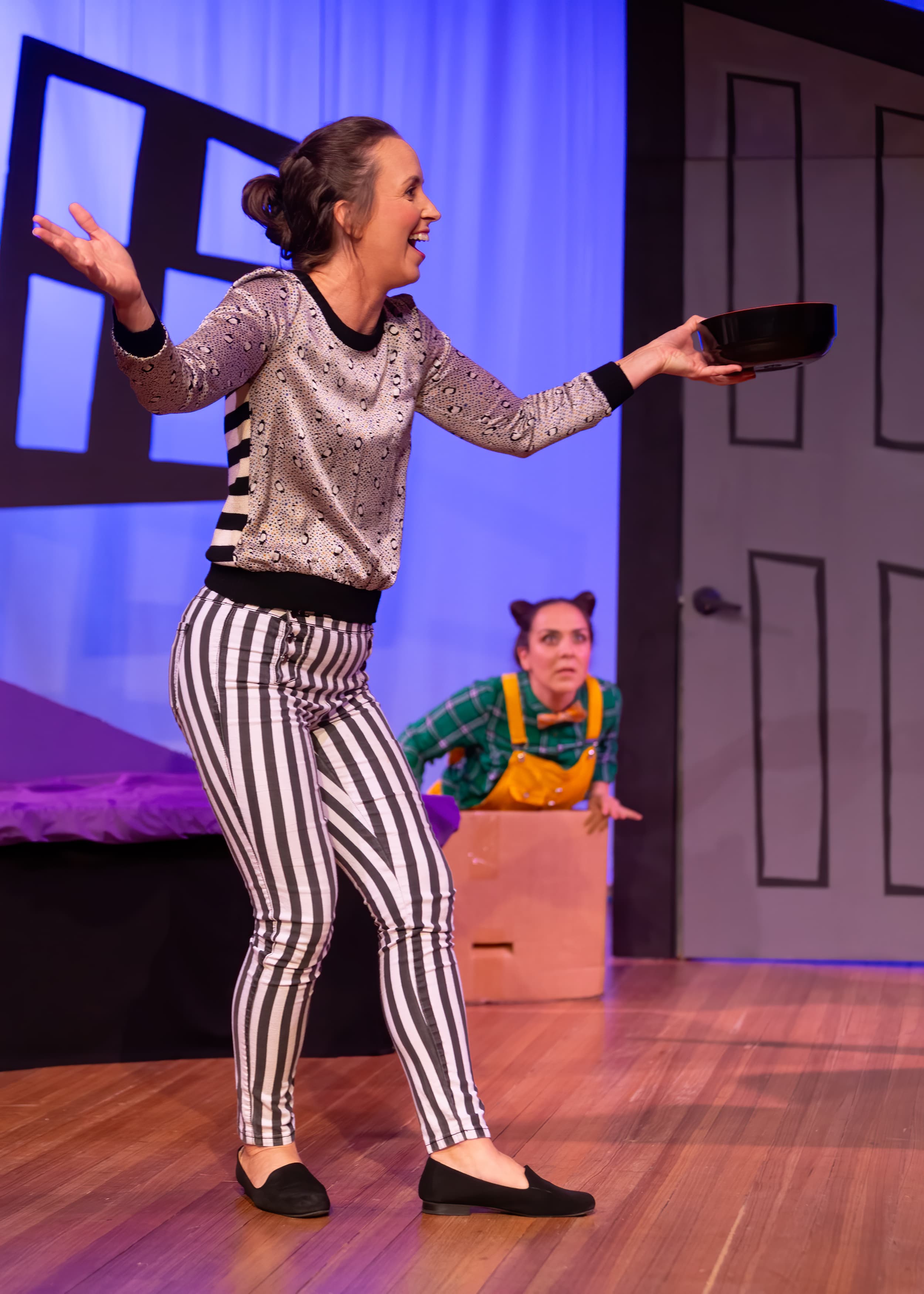 Rachel Hancock in comedy production — solo with frying pan