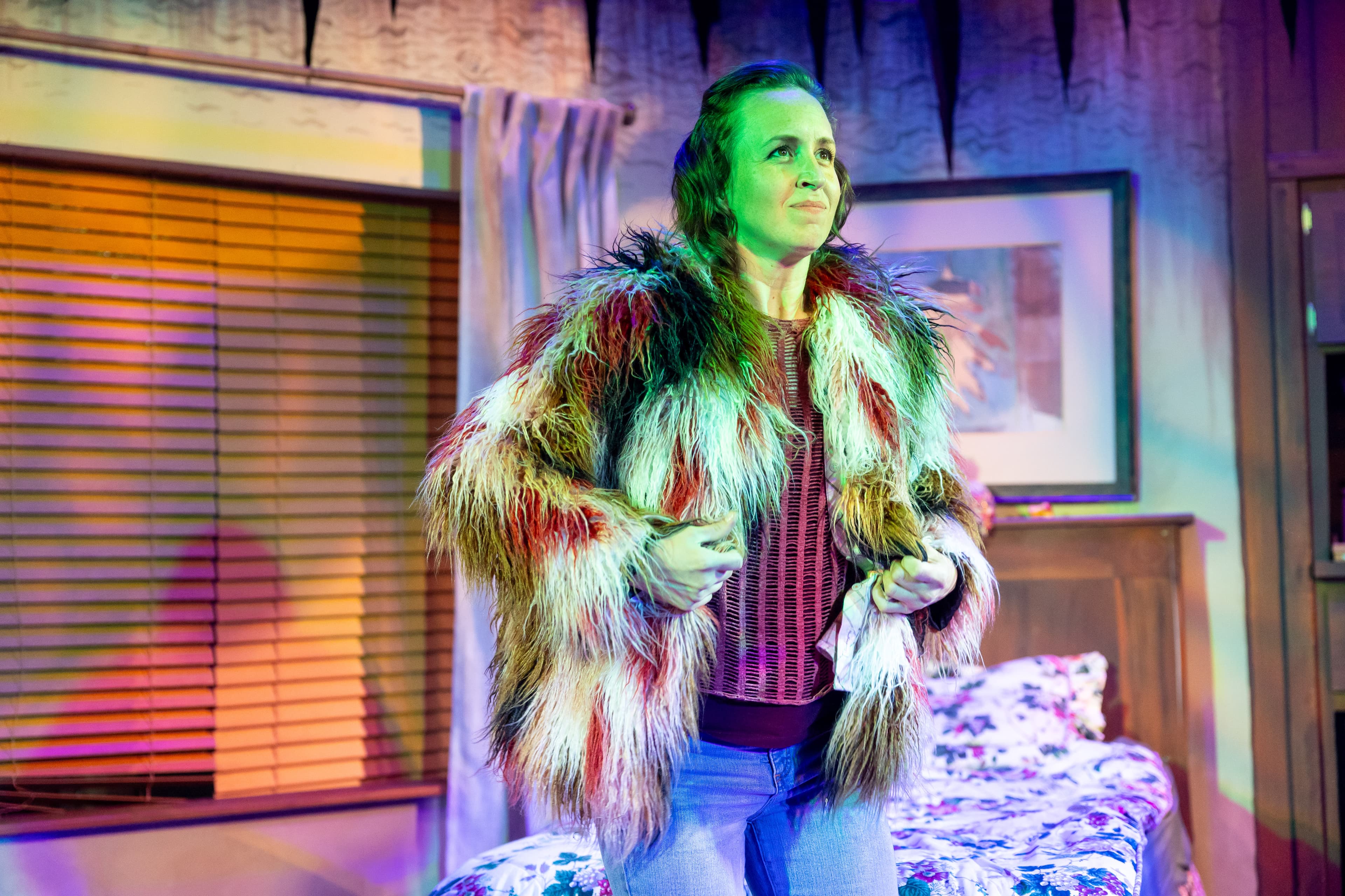 Rachel Hancock as Max in the wolf you feed — fur coat in warm light