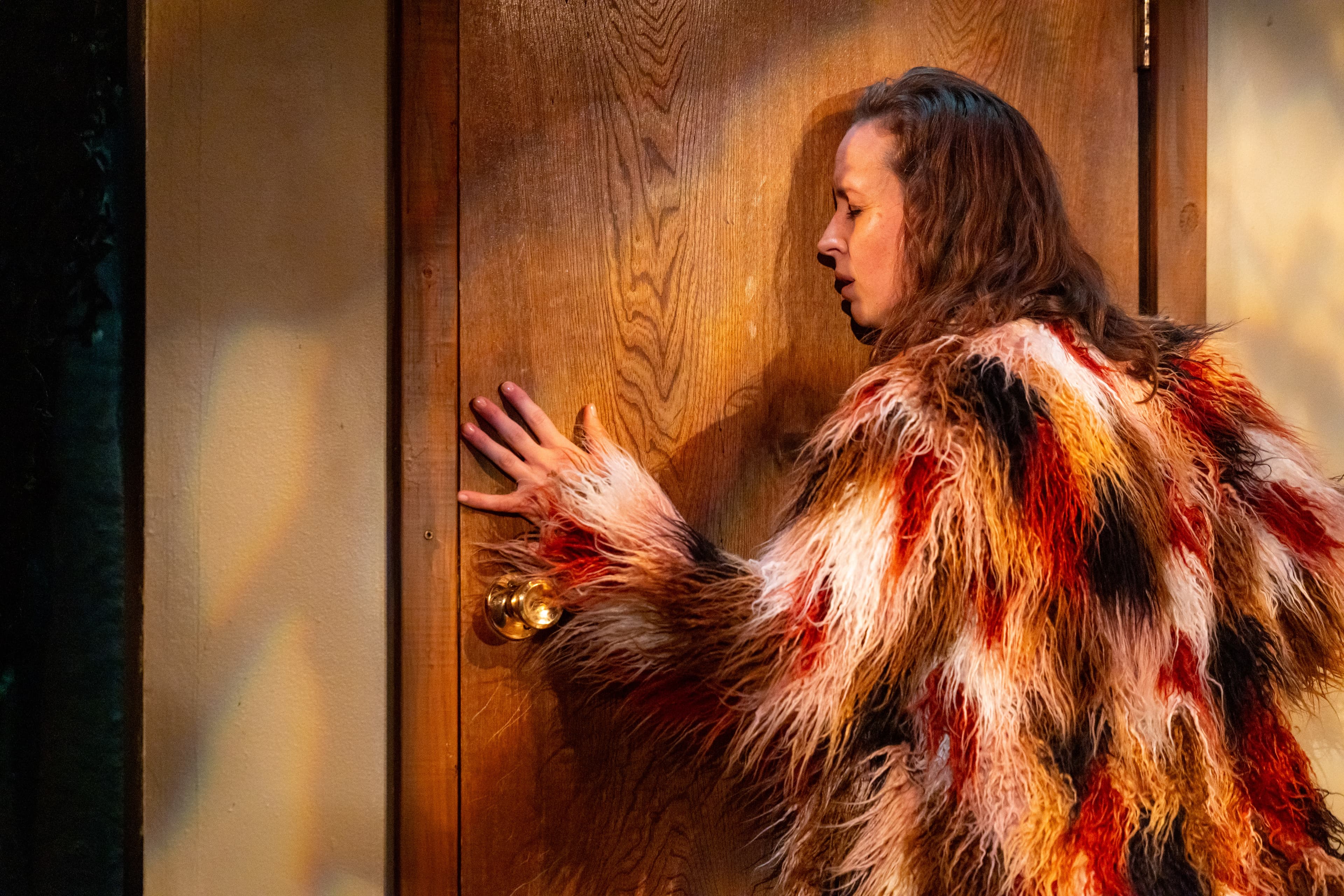 Rachel Hancock as Max in the wolf you feed — fur coat at the door