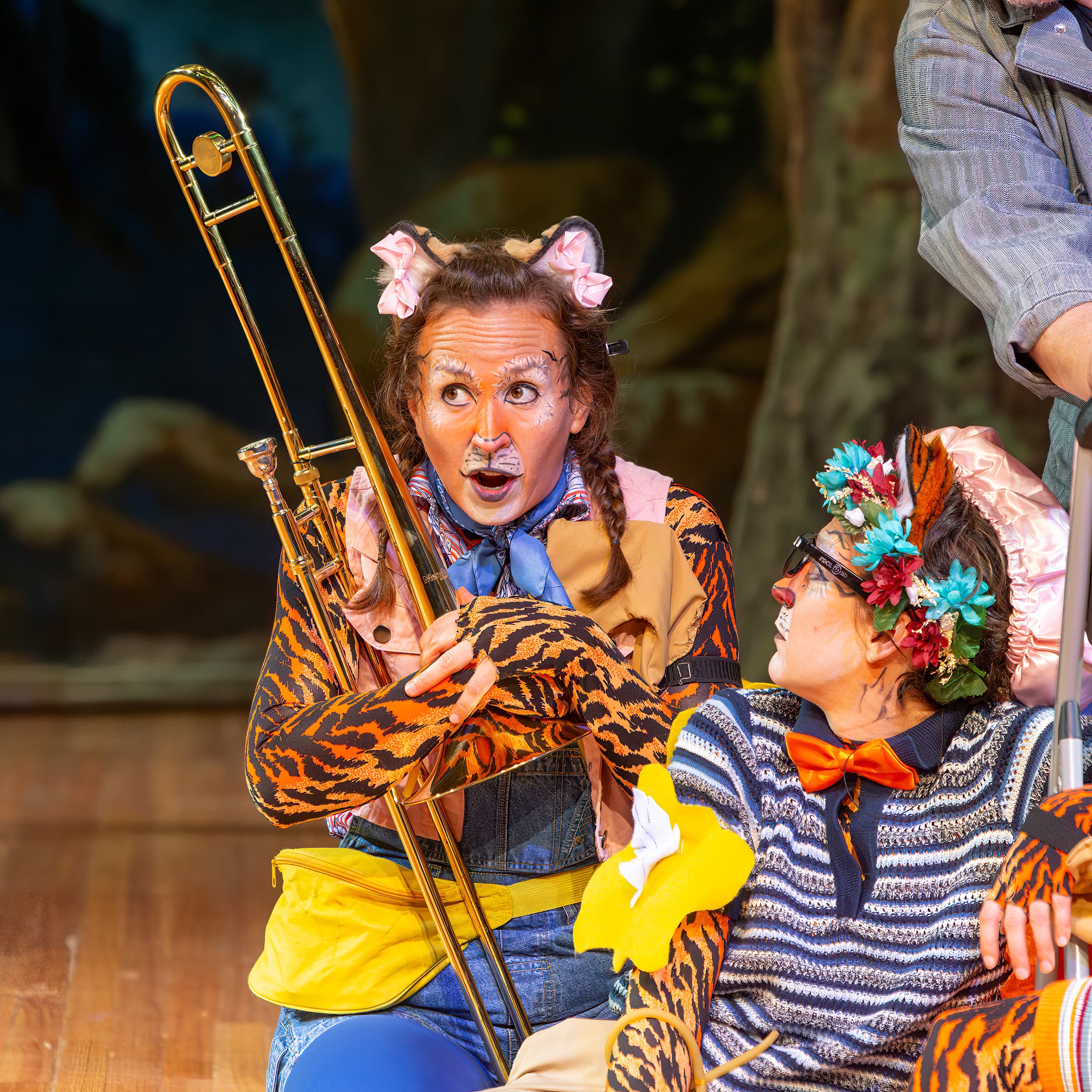 Rachel Hancock as tiger cat with trombone