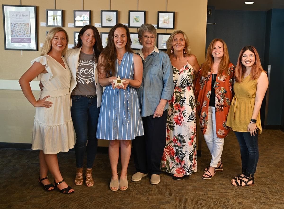 Group photo at the Art with Heart Georgetown library exhibition
